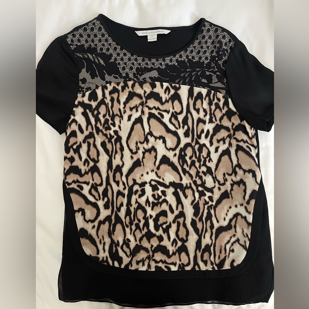 Diane vonfuerstenberg shirt size 4. Used in good condition.